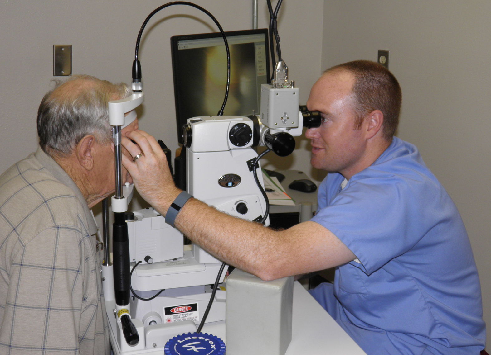 Dr. Lighthizer—a leading educator on advanced optometric procedures—performing YAG capsulotomy on a patient. 